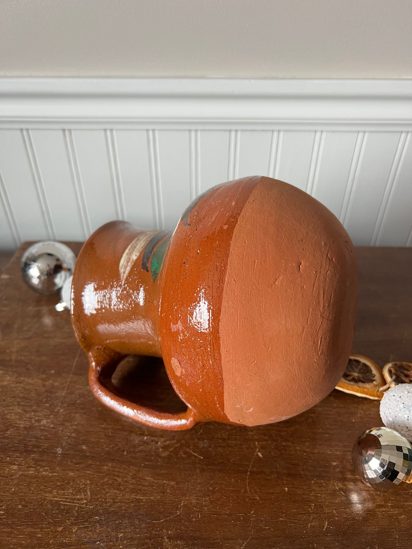 Hand-painted terracotta pitcher