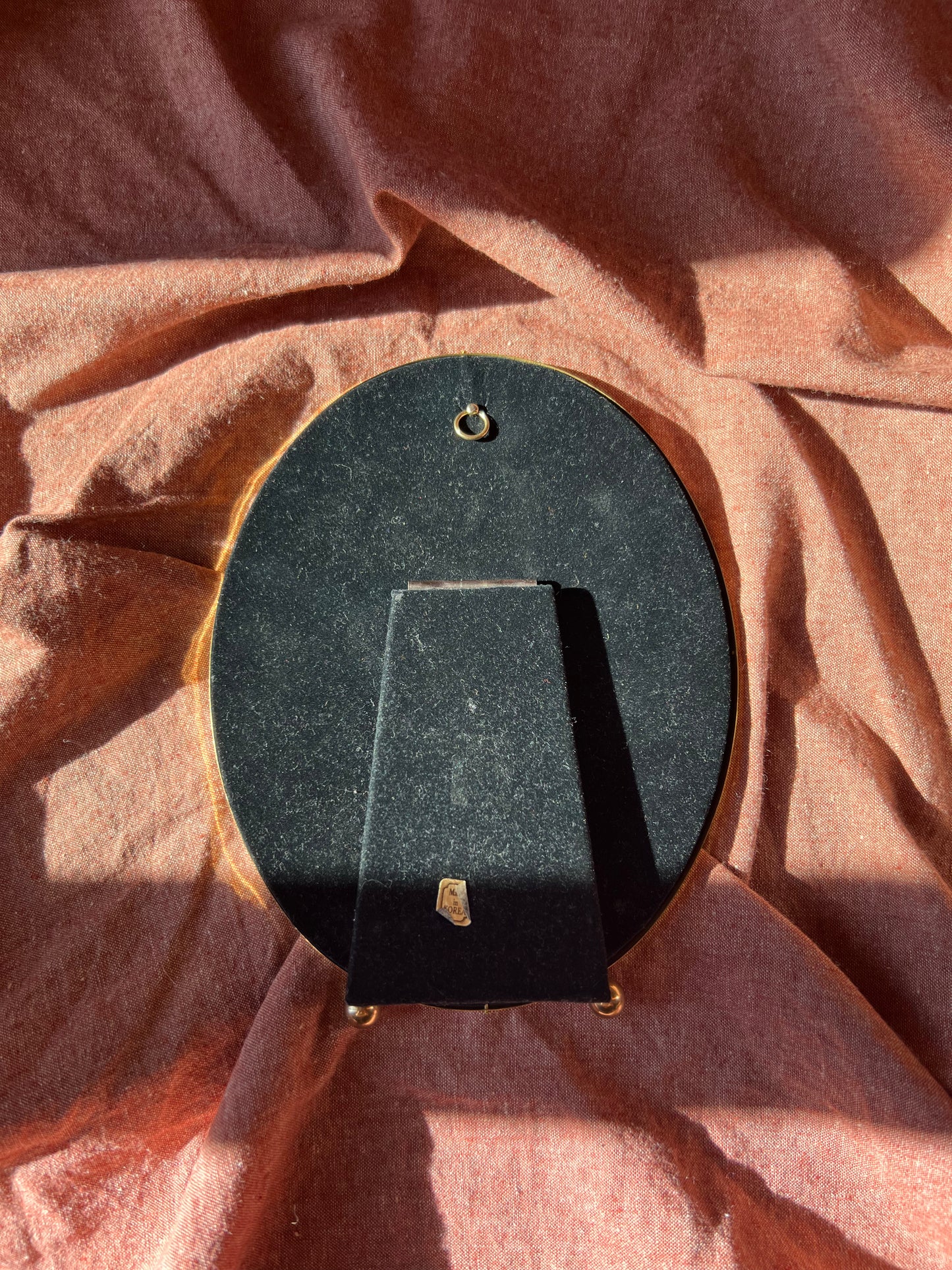 Brass oval frame