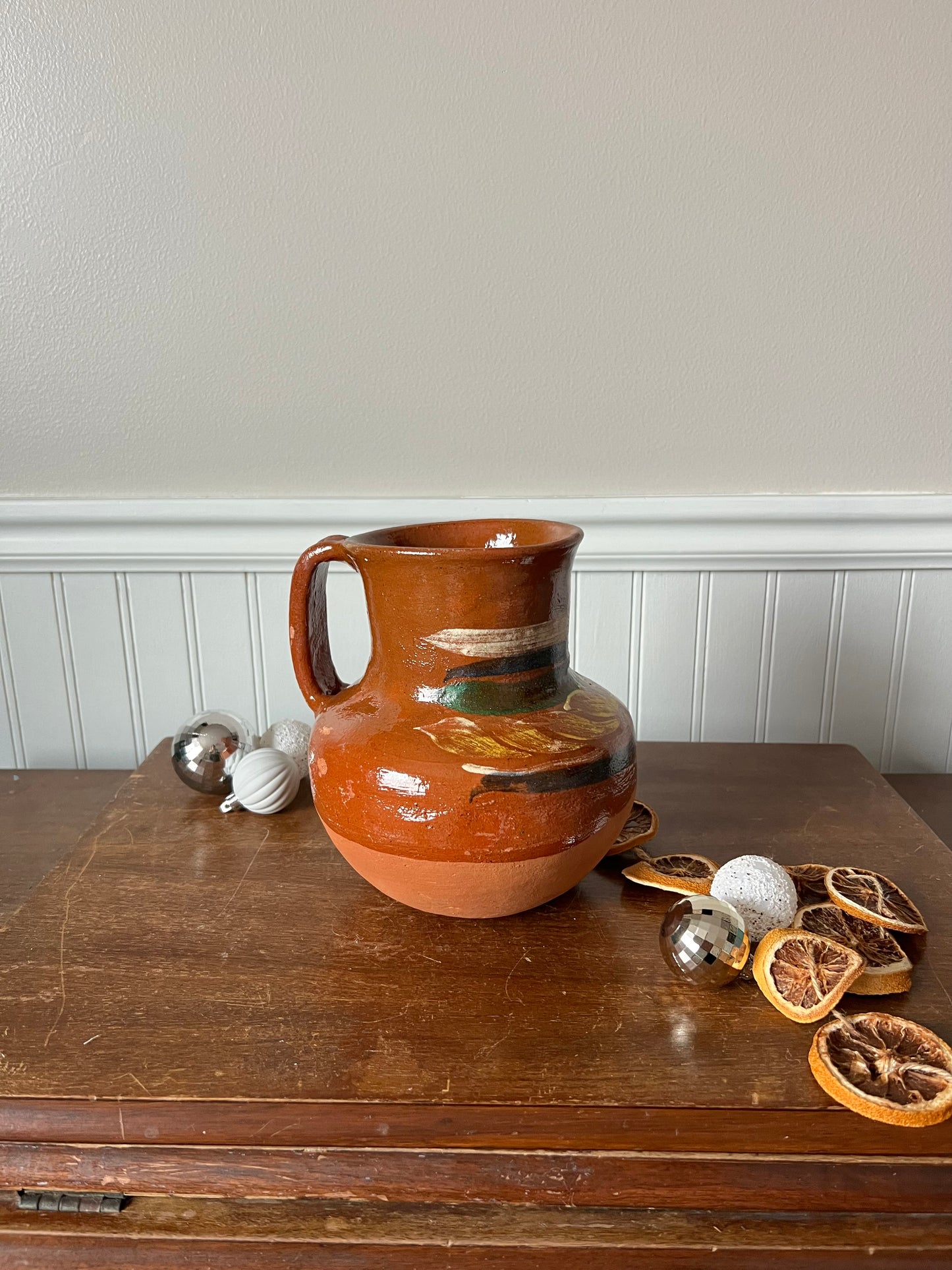 Hand-painted terracotta pitcher