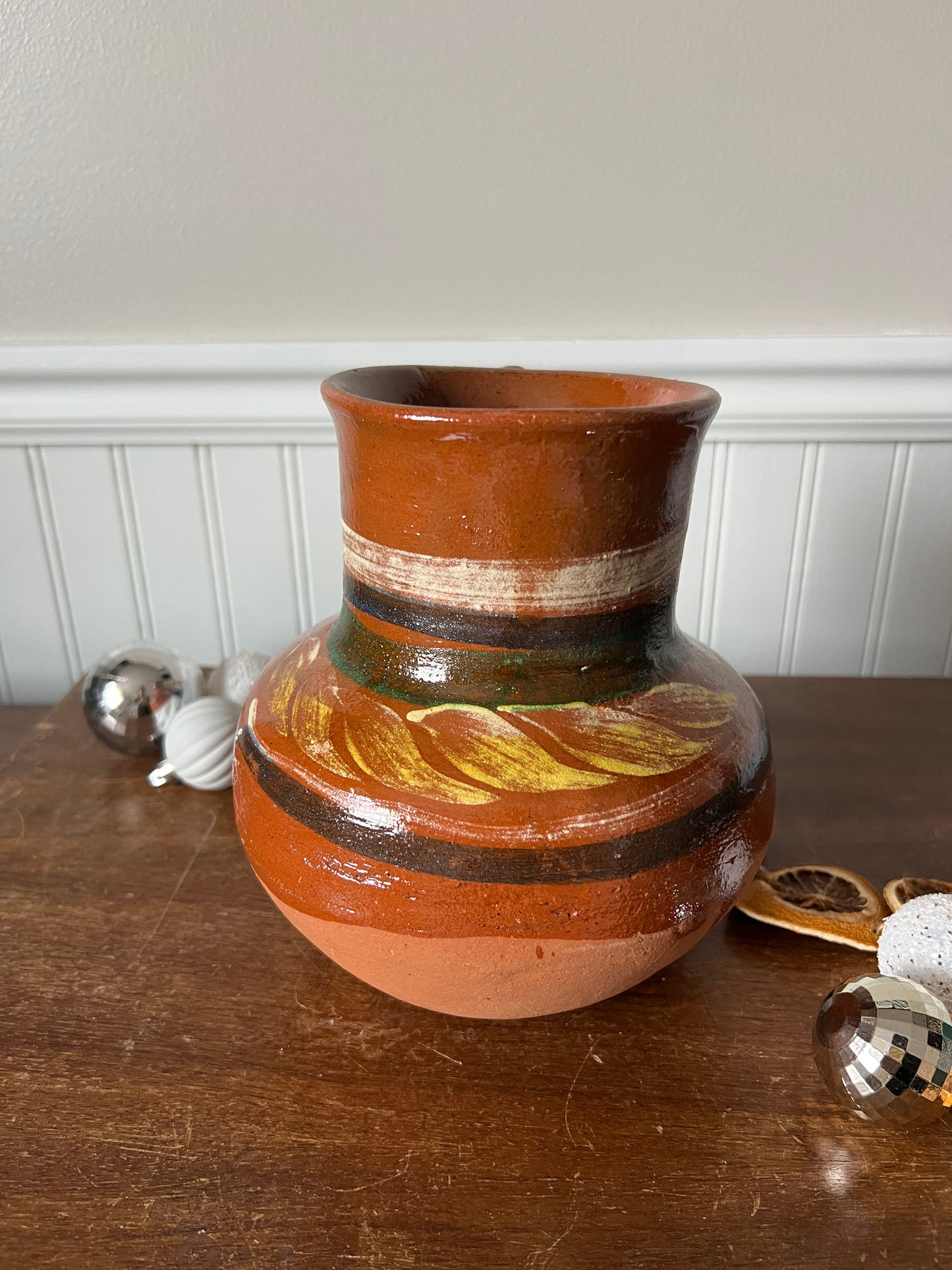 Hand-painted terracotta pitcher
