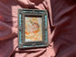 Ornate teal frame