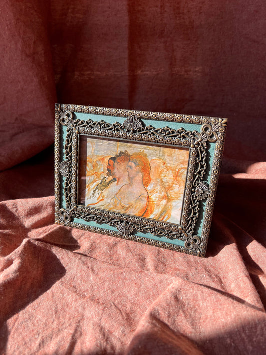 Ornate teal frame